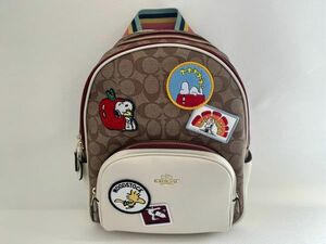 コーチ COACH リュックサック バックパック レディース スヌーピー PVCレザー カーキマルチ 保存袋付き 新品未使用