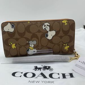 新品未使用 COACHスヌーピー長財布SNOOPYシグネチャー　C4327