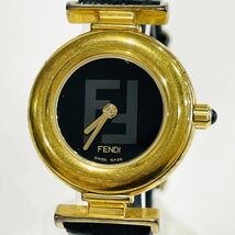 FENDI フェンディ レディース クォーツ 320L ラウンドフェイス ズッカロゴ GP ゴールド 黒文字盤 革ベルト ブラックレザー 不動品_画像1