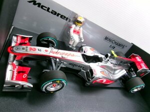 ミニチャンプス 1/18 ボーダフォン マクラーレン メルセデス MP4-25 #2 カナダGP 2010 L.ハミルトン フィギュア付 (8179-522)