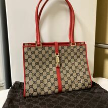 【ほぼ未使用・美品】GUCCI グッチ ハンドバッグ トートバッグ ジャッキー キャンバス地 レザー GGシマ シリアルあり 保存袋付き_画像1