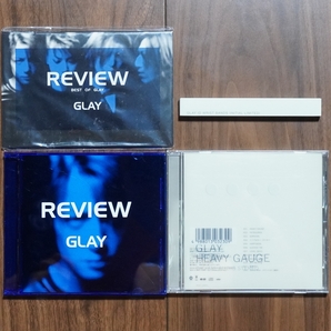 【GLAY/アルバムCD/12cm CD×2枚】REVIEW ～BEST OF GLAY～(初回限定特典？:ポストカード付) / HEAVY GAUGE(初回限定特典:リストバンド付)の画像1