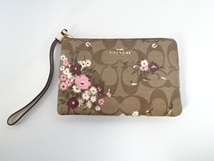 1M399MZ◎COACH コーチ ポーチ 小物入れ シグネチャー 花柄 約16×10.5cm◎中古【送料無料】_画像1