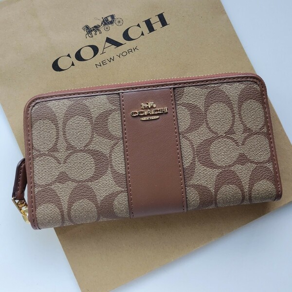 【新品】COACH コーチ 長財布 シグネチャー 　カーキ　サドル