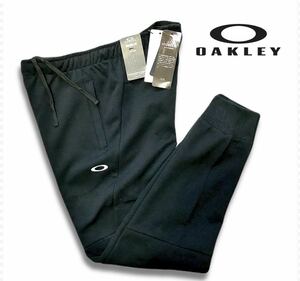 ◆470新品【メンズXL】黒 オークリー（OAKLEY）ゴルフにオススメ パンツ スウェット 速乾 テーパード ジョガーパンツ 肉厚