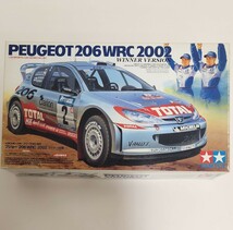 タミヤ1/24　未組立　同梱可　プジョー 206 WRC 2002 ウィナー仕様 人形2体付き　(スポーツカーシリーズNO.262)_画像1