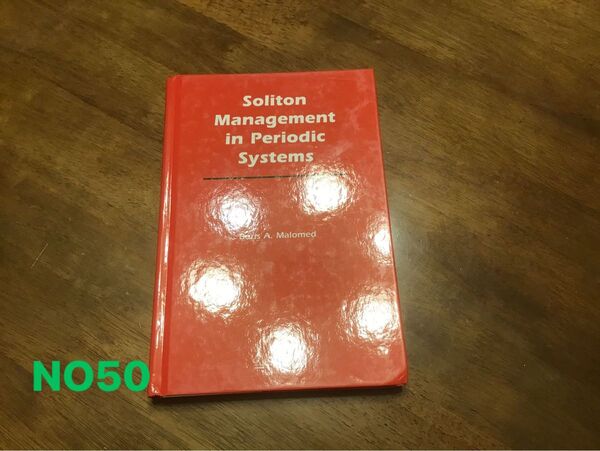 Soliton management in periodic systems