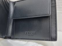 11225■【未使用】COACH　二つ折り財布　メンズ　エンボス　シグネチャーブラック　黒　コーチ　ブランド　コンパクトウォレット_画像6