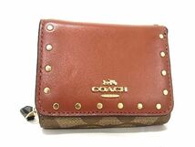 1円 ■極美品■ COACH コーチ シグネチャー レザー×PVC スタッズ 三つ折り 財布 ウォレット 小銭入れ レディース ブラウン系 AW1140_画像1