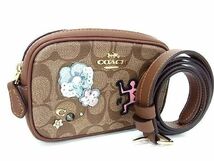 ■新品■未使用■ COACH コーチ F55644 シグネチャー キースヘディング コラボ PVC ウエストポーチ ボディバッグ ブラウン系 AT4804_画像1