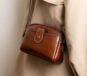 新しい、柔らかい牛革バッグ、用途が広い、ハンドバッグ、化粧品バッグ、正方形のバッグ