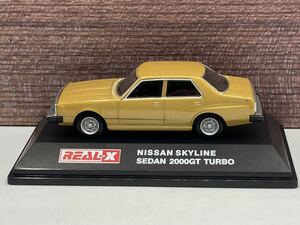  prompt decision have *REAL-X 1/72 NISSAN SKYLINE SEDAN 2000GT TURBO Nissan Skyline sedan C211 Japan gold Gold * minicar 