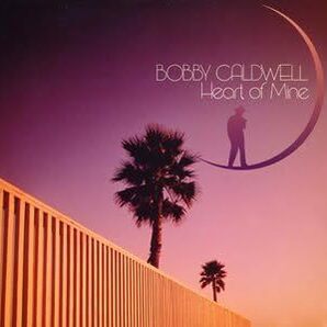 名盤 Bobby Caldwell HEART OF MINE ボビー・コールドウェル 日本国内盤帯付き 彼が生み出す曲はヴェルヴェットの肌触りを感じる の画像1