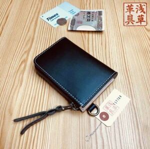 .. leather . Italian leather compact wallet black x natural 