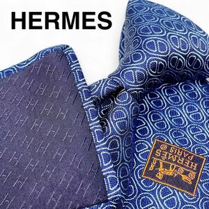 HERMES エルメスH柄ロゴ総柄シルクネクタイ マイヨン シェーヌダンクル総柄ネイビー×水色ライトブルー メンズハイブランド美品