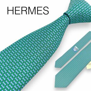 新品未使用美品 HERMES エルメス フランス製シルク100%メンズブランドネクタイ スケートボード総柄 緑 グリーン 水色 ライトブルー