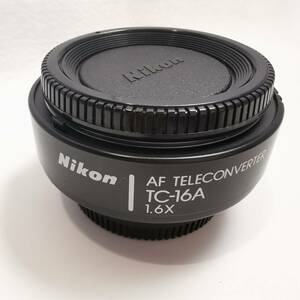 USED◆Nikon (ニコン) AF TELECONVERTER テレコンバーター TC-16A 1.6X 前後キャップ付き◆実写未確認/現状出品/経年品