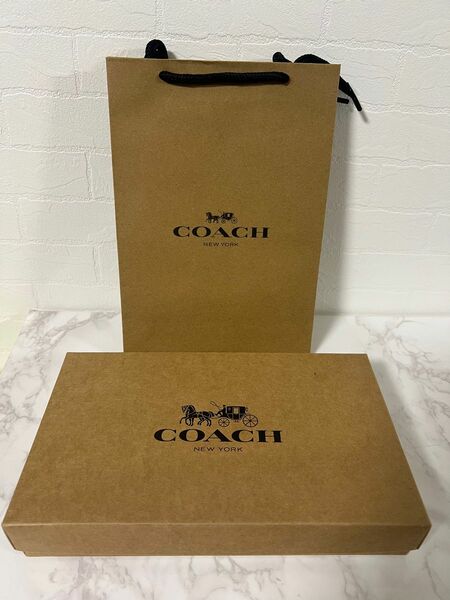 《新品》COACH☆小物入れ 巾着袋☆ ギフトボックス☆ショッパー付き