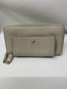 [ superior article ] Tod's round fastener long wallet round Zip long wallet type pushed . light gray 