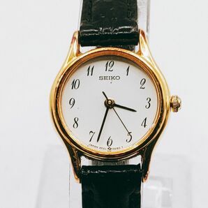 #50 SEIKO セイコー 2P21-0A80 腕時計 アナログ 3針 白文字盤 ゴールド色 時計 とけい トケイ アクセサリー