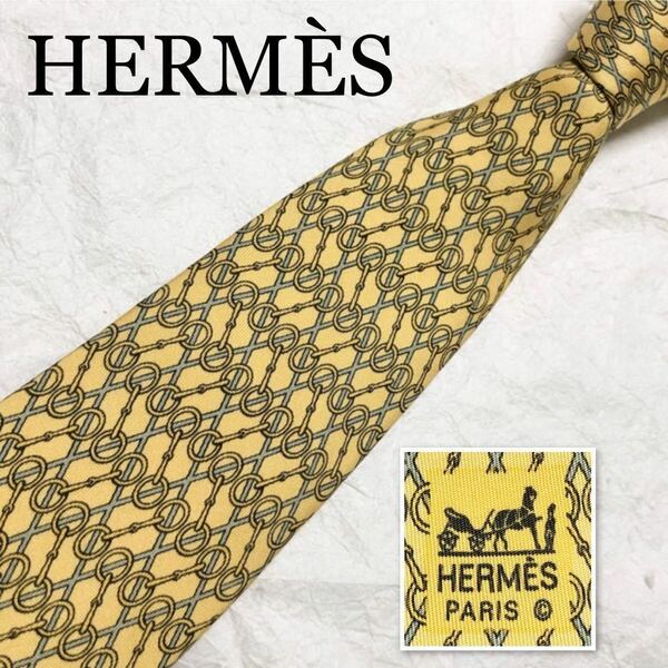 HERMES エルメス　ネクタイ　金具　格子　総柄　シルク100% フランス製　イエロー