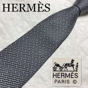 ■美品■HERMES エルメス　ネクタイ　金具　総柄　レジメンタルストライプ風　シルク100% フランス製　グレー　ビジネス