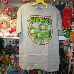 TEENAGE MUTANT NINJA TERTLES★ニンジャタートルズ★Tシャツ★グレー★Mサイズ★新品★フィギュア★人形★