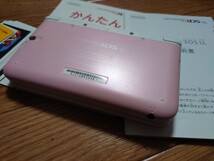 動作確認済み 中古ニンテンドー3DS LL本体ピンク 取説ARカード有り 電源アダプタータッチペン無し初期設定済み長期自宅保管 キズ汚れ有り _画像7