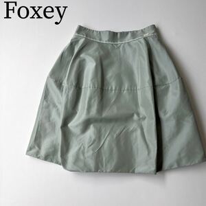 FOXEY BOUTIQUE フォクシー フレアスカート レディマカロン　膝丈 ハリ感　ボトムス　ロゴプレート タック　プリーツ レディース