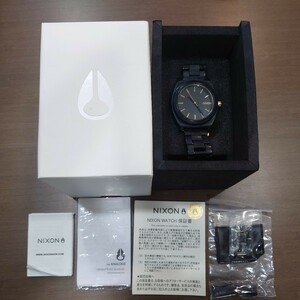 T★1円〜中古品 電池交換済 Nixon ニクソン 黒 クォーツ 腕時計 MORE IS MORE THE TIME TELLER ACETATE 動作品 コマ付き