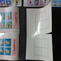 お年玉 年賀切手シートが30枚、30年分が有ります。どれも未使用切手シートで、綺麗ですが長年しまって置いた切手シートの為、やけやしみが_画像9