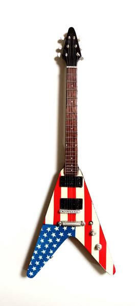 米国旗Vモデルミニチュアギター25 cm。ミニ楽器