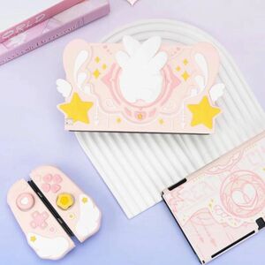 ニンテンドースイッチ 有機EL用ドックカバー 天使 星 Nintendo Switch かわいい 羽根 Angel ガーリー