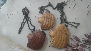 a dog tree carving necklace 3 piece set 