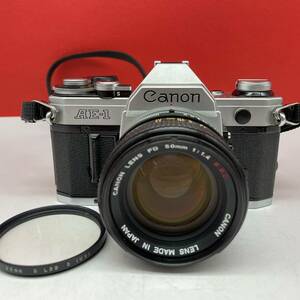 □ Canon AE-1 フィルムカメラ 一眼レフカメラ ボディ LENS FD 50mm F1.4 S.S.C. レンズ 動作確認済 シャッター、露出計OK キャノン