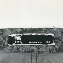 OAKLEY オークリー 422084JP ストレッチパンツ スカル刺繍 総柄 グレー系 34 [240101089964] ゴルフウェア メンズ_画像3