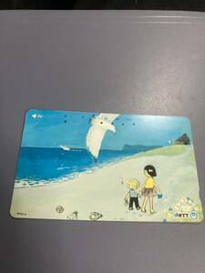  telephone card used . summer. sea side . child 