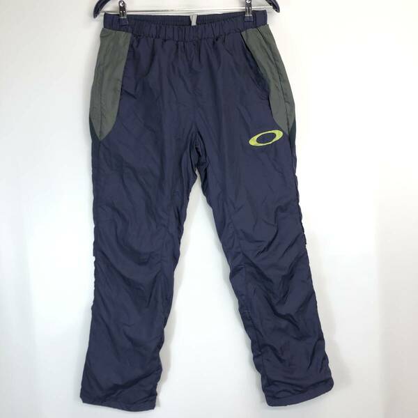 オークリー OAKLEY 裏地付きナイロンパンツ Mサイズ ネイビー系 ウインドブレーカー ENHANCE WIND PANT2.3 419253JP 429311JP