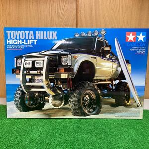 ★タミヤ　1/10電動ラジコン【ハイラックス・HIGH-LIFT】 4X4 PICK-UP TRUCK サーフボード付き。