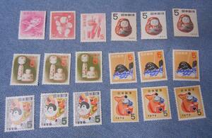 1952年～1959年（昭和27年～34年）　年賀切手18枚　1952年おきなの面　1953年三番叟人形　1954年起き上がり達磨3枚など
