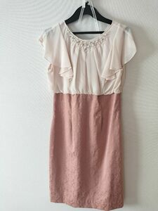 ★値下げ★■RUIRUE■新品タグ付き■Mサイズ■パーティー 結婚式お呼ばれワンピース■胸元ビジュー■バックリボン異素材切り替え