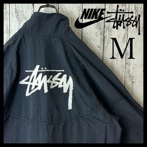 【BTSジョングク着用】ナイキ ステューシー NIKE STUSSY コラボ ハーフジップ M ナイロンジャケット アノラックジャケット 黒 ブラック 白