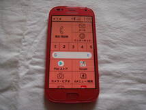 中古【docomo】らくらくスマートフォン (F-42A)/ピンク/SIMロック解除済/充電能力良好_画像1