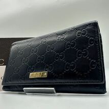 1747 廃盤 入手困難● GUCCI グッチ 長財布 ウォレット ロゴプレート シマ GG レザー コイン カード ケース ブラック 本革 ゴールド金具_画像1