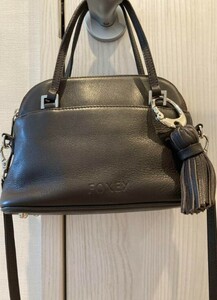 フォクシー FOXEY ミニバッグ 2way ショルダーバッグ ハンドバッグ ブラウン ボディバッグ ストラップ取外し タッセルチャーム