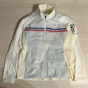 le coq sportif ルコックスポルティフ ゴルフウェア新品タグ付き ロゴ付き ウインドブレーカー上 メンズ　ホワイト　サイズLL　ブルゾン