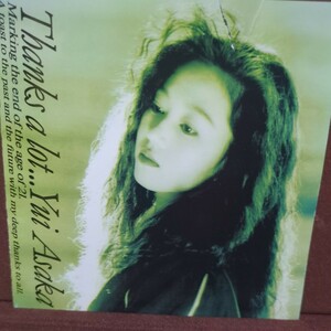 ■T32■ 浅香唯 のアルバム「サンクス ア ロット」ブックレットにヤブレあり。