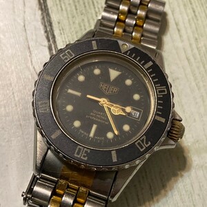 ◆稼働品◆人気◆ TAG HEUER タグホイヤー クォーツ980.019 1000シリーズ プロフェッショナル200M 黒文字盤 デイト メンズ/ボーイズ腕時計