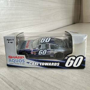 【A0275-24】未開封『Action 1/64 ナスカー CARL EDWARDS #60 SHARP AQUOS 2007』ミニカー レーシングカー（同梱可）