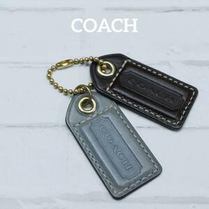 【匿名配送】COACH コーチ キーホルダー レザー 黒 タグ ロゴ 水色